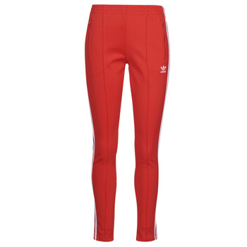 vaatteet Naiset Verryttelyhousut adidas Originals SST PANTS PB Ruskea / marine / musta / Punainen