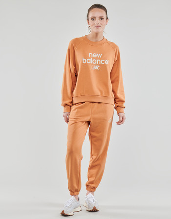 vaatteet Naiset Verryttelyhousut New Balance Essentials Reimagined Archive French Terry Pant Oranssi